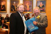 From Right: Dr. Colin Storey presented souvenir to Mr. Christopher Warnock, CEO of ebrary